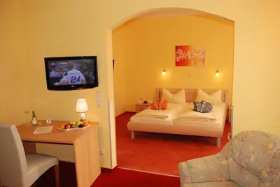 Ein Bett oder Betten in einem Zimmer der Unterkunft Hotel Heissinger