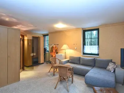 Ein Sitzbereich in der Unterkunft Retreat with Sauna, Hot Tub