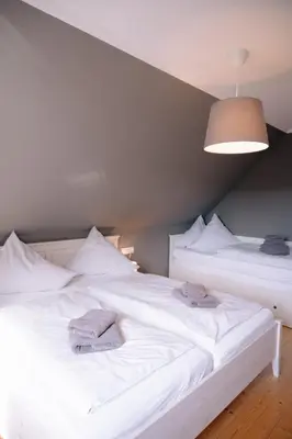 Ein Bett oder Betten in einem Zimmer der Unterkunft Ferienhaus Glücksgriff Pottenstein