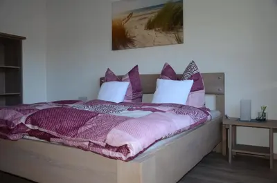 Ein Bett oder Betten in einem Zimmer der Unterkunft Ferienhaus Tüchersfeld