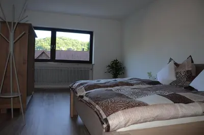 Ein Bett oder Betten in einem Zimmer der Unterkunft Ferienhaus Tüchersfeld