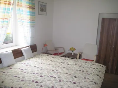 Ein Bett oder Betten in einem Zimmer der Unterkunft Hotel 