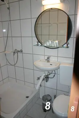 Ein Badezimmer in der Unterkunft Hotel 