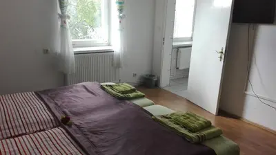 Ein Bett oder Betten in einem Zimmer der Unterkunft Hotel 