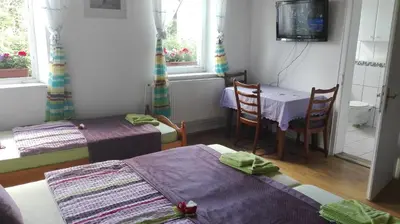 Ein Bett oder Betten in einem Zimmer der Unterkunft Hotel 