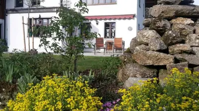 Ein Garten an der Unterkunft Ferienwohnung Tretter