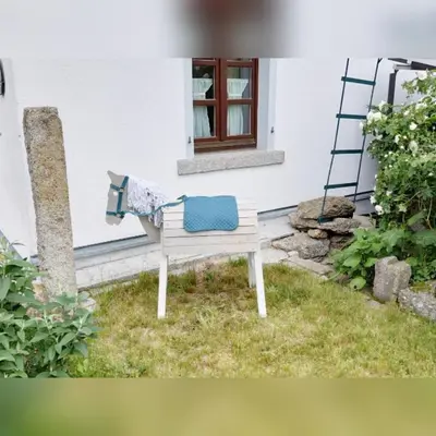 Ein Garten an der Unterkunft Ferienwohnung Tretter