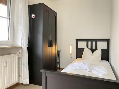 Ein Bett oder Betten in einem Zimmer der Unterkunft SAD171 - Monteurappartement in super Lage