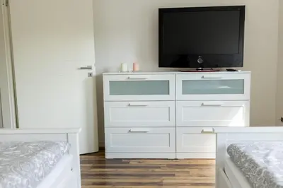 Ein Bett oder Betten in einem Zimmer der Unterkunft Schöne Ferienwohnung in Oberkotzau am Fichtelgebirge
