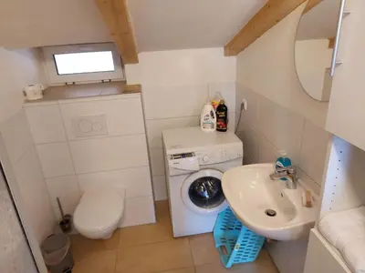 Ein Badezimmer in der Unterkunft Apartment Business