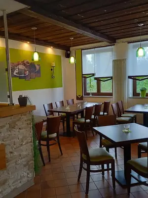 Ein Restaurant oder anderes Speiselokal in der Unterkunft Das Arni´s