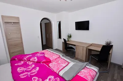 Ein Bett oder Betten in einem Zimmer der Unterkunft Das Arni´s