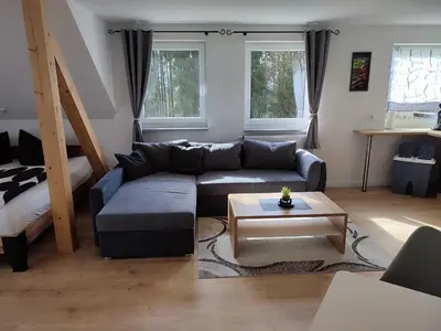 Ein Sitzbereich in der Unterkunft Kutscherhaus
