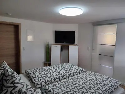 Ein Bett oder Betten in einem Zimmer der Unterkunft Kutscherhaus