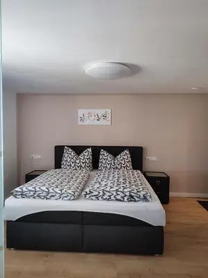 Ein Bett oder Betten in einem Zimmer der Unterkunft Kutscherhaus