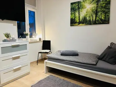 Ein Sitzbereich in der Unterkunft moderne Ferienwohnung am Stadtwald von Plauen