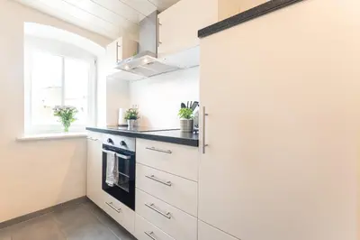 Küche/Küchenzeile in der Unterkunft Lexapartments Design Apartment Altstadt Toplage 2 Zimmer