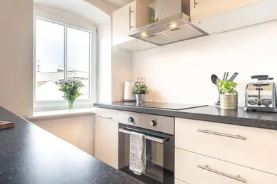 Küche/Küchenzeile in der Unterkunft Lexapartments Design Apartment Altstadt Toplage 2 Zimmer