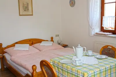 Ein Bett oder Betten in einem Zimmer der Unterkunft Gästehaus Gertraud