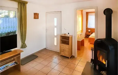 Ein Bett oder Betten in einem Zimmer der Unterkunft Ferienhaus Hauptstrasse B