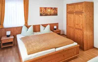 Ein Bett oder Betten in einem Zimmer der Unterkunft Ferienhaus Hauptstrasse B