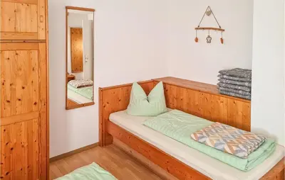 Ein Bett oder Betten in einem Zimmer der Unterkunft Ferienhaus Hauptstrasse B
