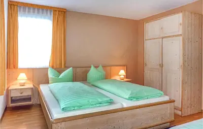 Ein Bett oder Betten in einem Zimmer der Unterkunft Ferienhaus Hauptstrasse C