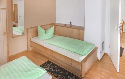 Ein Bett oder Betten in einem Zimmer der Unterkunft Ferienhaus Hauptstrasse C