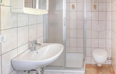 Ein Badezimmer in der Unterkunft Ferienhaus Hauptstrasse C