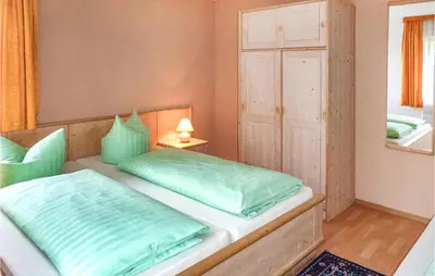 Ein Bett oder Betten in einem Zimmer der Unterkunft Ferienhaus Hauptstrasse D