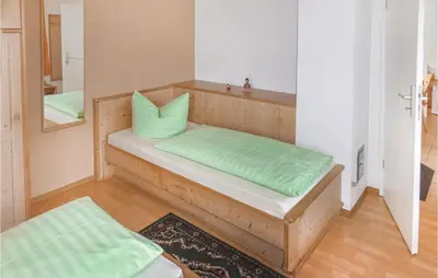 Ein Bett oder Betten in einem Zimmer der Unterkunft Ferienhaus Hauptstrasse D