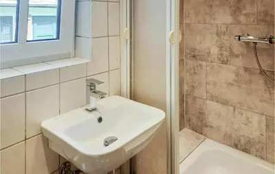 Ein Badezimmer in der Unterkunft Ferienhaus Am Trieberweg S