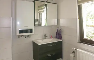 Ein Badezimmer in der Unterkunft Ferienhaus Waldgrundst�ck P