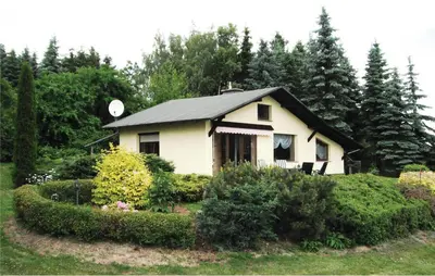 Ein Garten an der Unterkunft Ferienhaus Waldgrundst�ck P