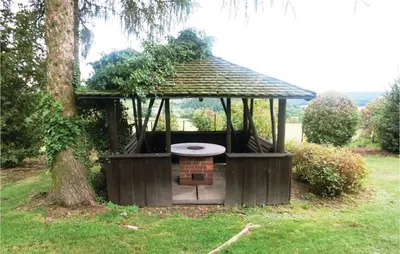 Ein Garten an der Unterkunft Ferienhaus Waldgrundst�ck P