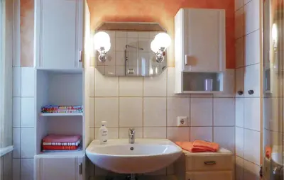 Ein Badezimmer in der Unterkunft Ferienhaus Sportplatzweg E