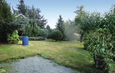 Ein Garten an der Unterkunft Ferienhaus Thiergartener Str. T