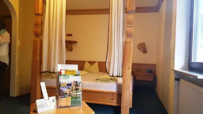 Ein Bett oder Betten in einem Zimmer der Unterkunft Meister BÄR HOTEL Bayreuth
