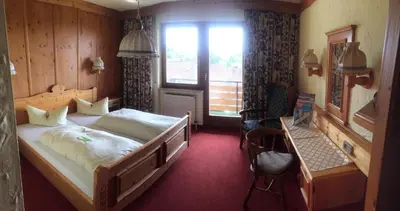 Ein Bett oder Betten in einem Zimmer der Unterkunft Meister BÄR HOTEL Bayreuth