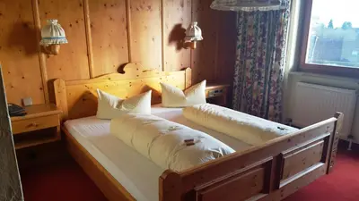 Ein Bett oder Betten in einem Zimmer der Unterkunft Meister BÄR HOTEL Bayreuth