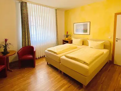 Ein Bett oder Betten in einem Zimmer der Unterkunft Meister BÄR HOTEL Ostbayern