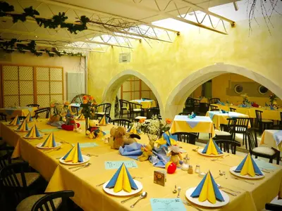 Ein Restaurant oder anderes Speiselokal in der Unterkunft Meister BÄR HOTEL Ostbayern