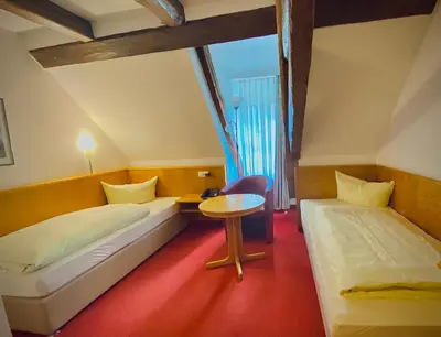 Ein Bett oder Betten in einem Zimmer der Unterkunft Meister BÄR HOTEL Ostbayern