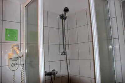 Ein Badezimmer in der Unterkunft Hotel Gasthof Zum weissen Lamm