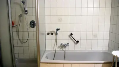 Ein Badezimmer in der Unterkunft Hotel Gasthof Zum weissen Lamm