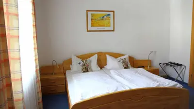 Ein Bett oder Betten in einem Zimmer der Unterkunft Hotel Gasthof Zum weissen Lamm