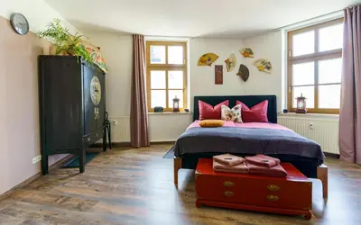 Ein Bett oder Betten in einem Zimmer der Unterkunft Kerkermeister Pension