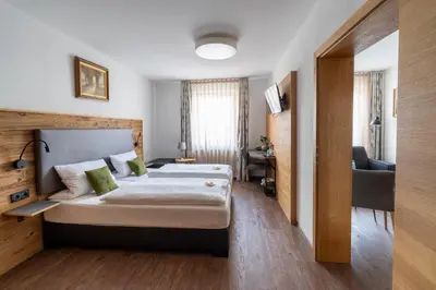 Ein Bett oder Betten in einem Zimmer der Unterkunft Hotel zum ehem. königl. Bayr. Forsthaus