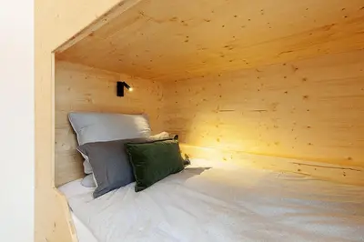 Ein Bett oder Betten in einem Zimmer der Unterkunft Die Fichtelsuite 1-6 Pers Ferienwohnung nahe Ochsenkopf Süd 800m in Fleckl