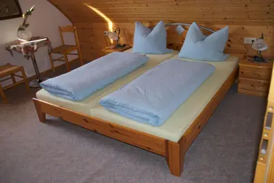 Ein Bett oder Betten in einem Zimmer der Unterkunft Gasthof Jägerheim